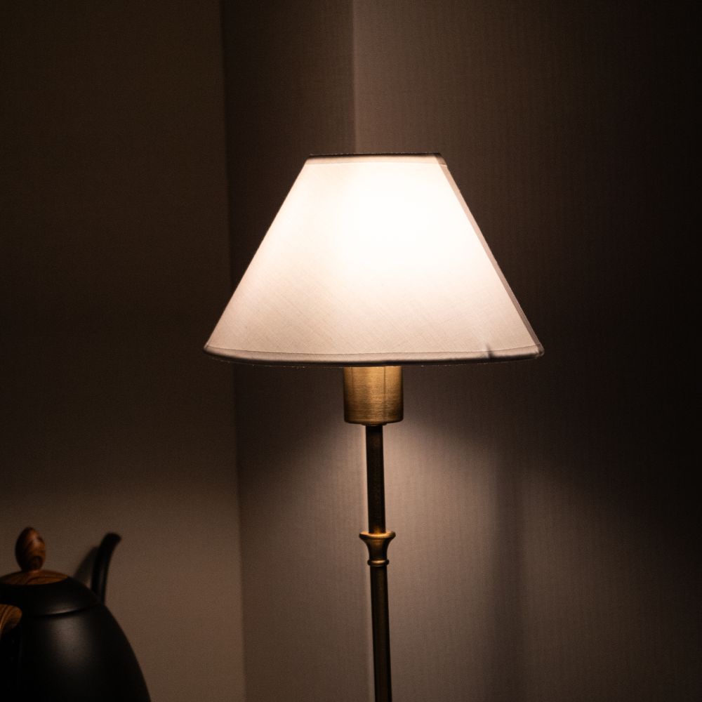 white shade lamp